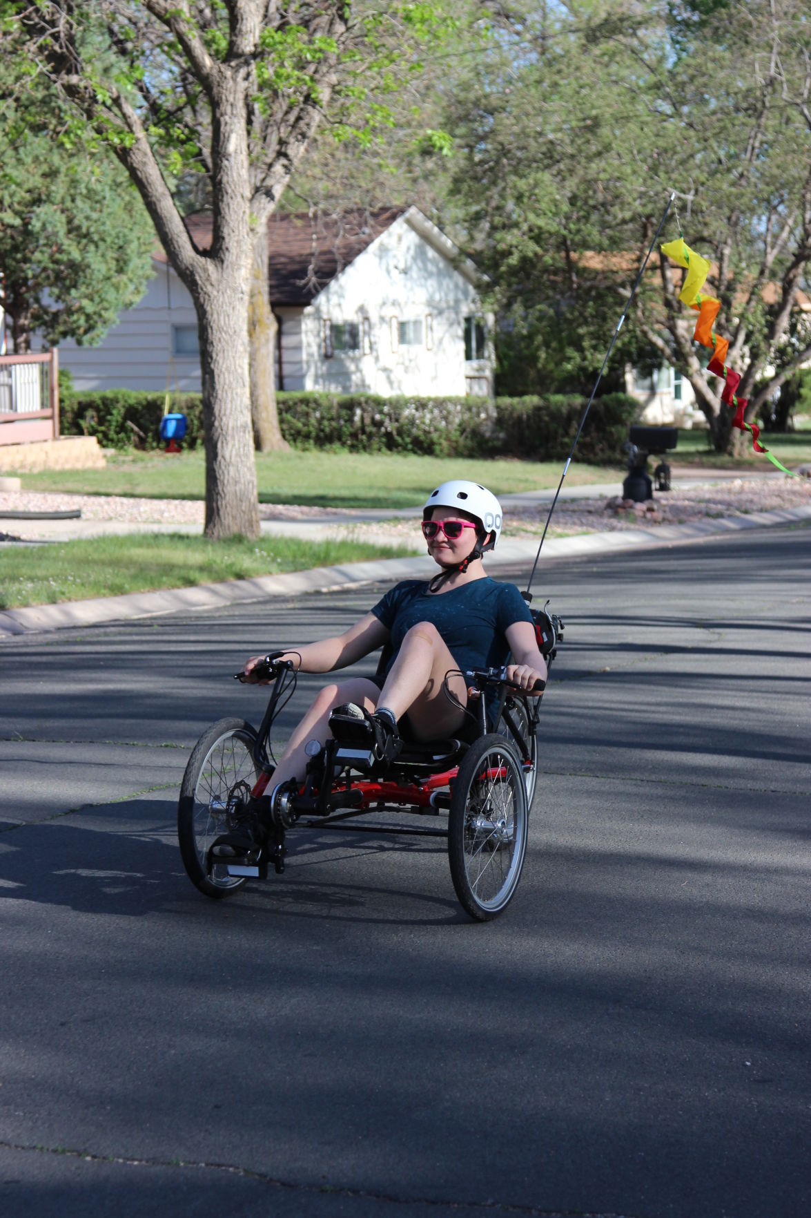 Lily Griesan riding an incumbent bicycle this spring